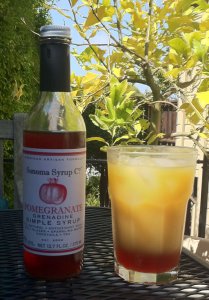Tequila Sunrise made with Sonoma Syrup Grendine